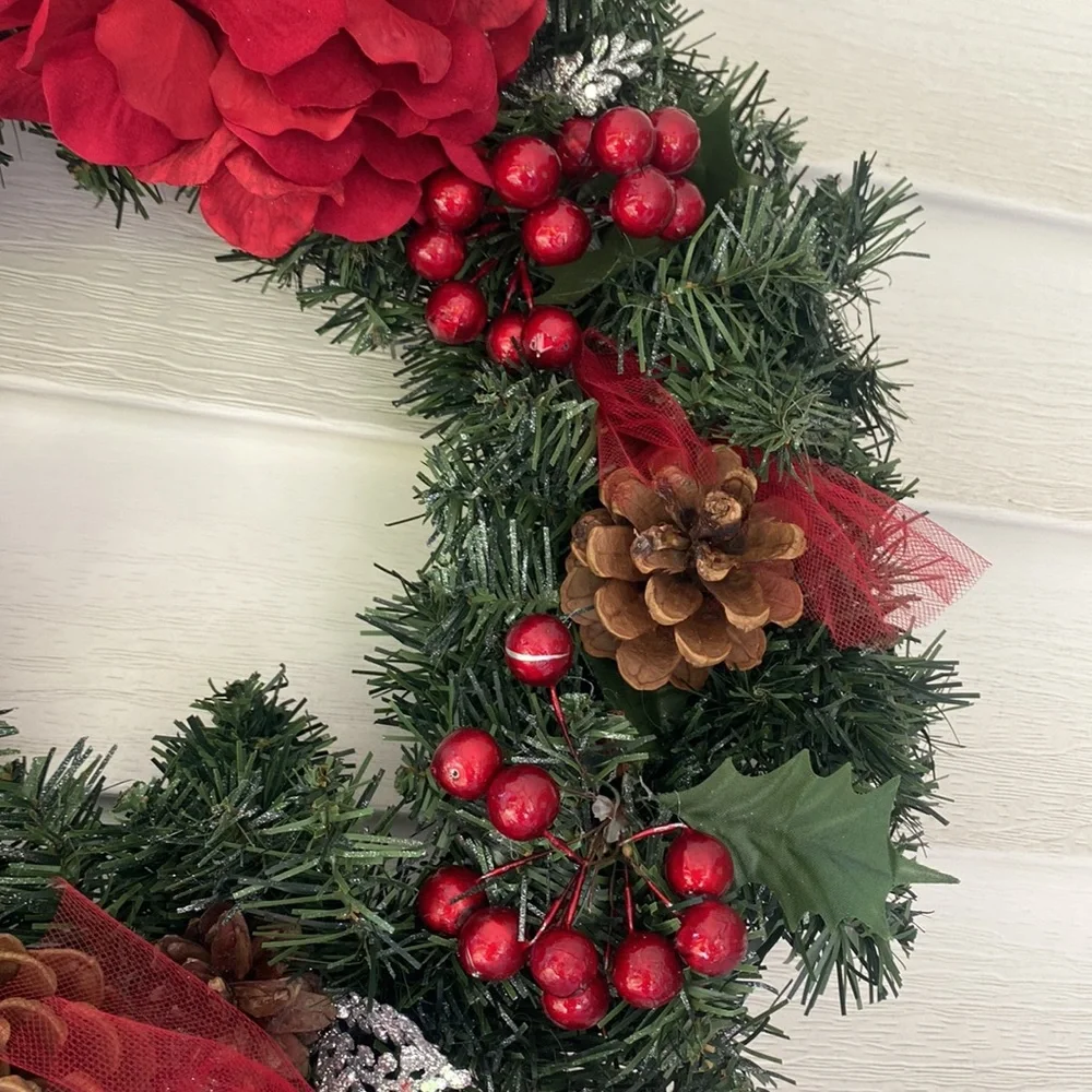 Evergreen Faux Wreath Trimmed with red accents and pine ones